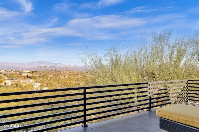 balcony featuring a mountain view