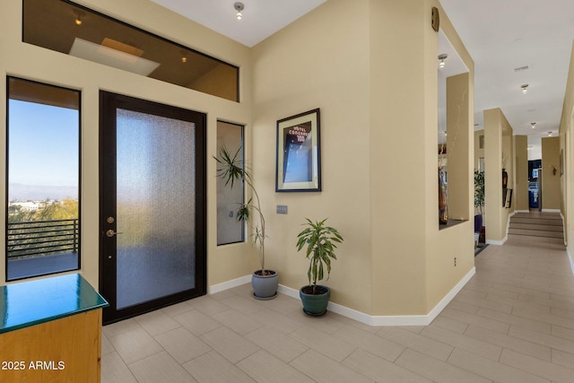 foyer with light tile patterned floors