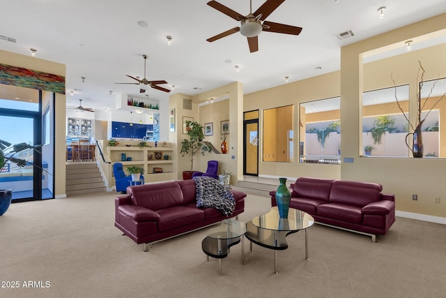 living room featuring light colored carpet