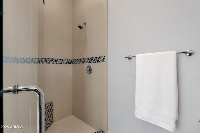 bathroom featuring an enclosed shower