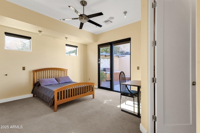 carpeted bedroom featuring access to outside and ceiling fan