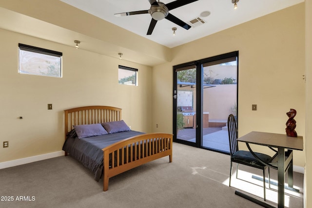 carpeted bedroom featuring access to exterior and ceiling fan