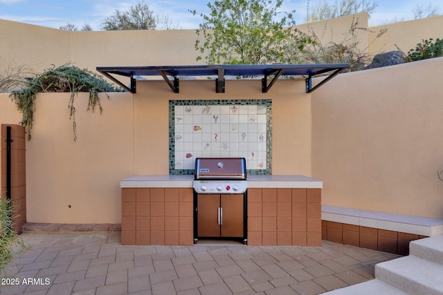 view of patio / terrace featuring a grill