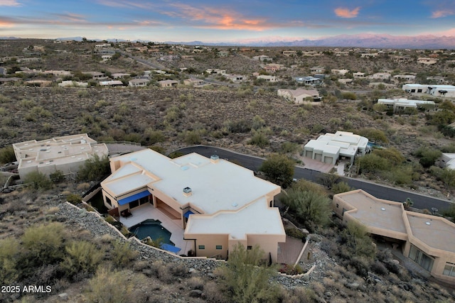 view of aerial view at dusk