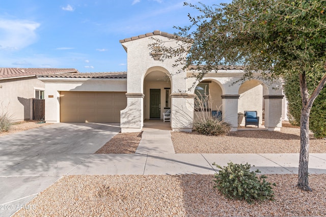 mediterranean / spanish-style house featuring a garage