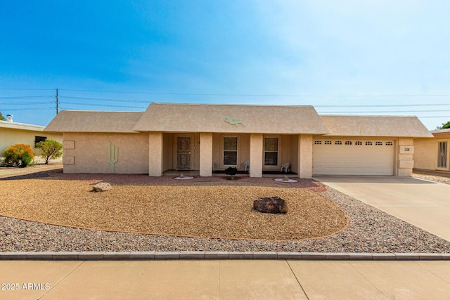 11109 W Granada Dr, Sun City, AZ 85373 - ranch-style house with driveway, stucco siding, and an attached garage