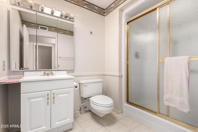 11109 W Granada Dr, Sun City, AZ 85373 - full bath with vanity, toilet, tile patterned floors, and a shower stall