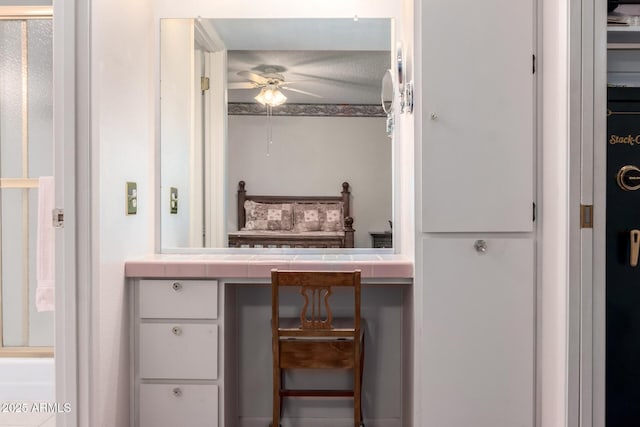11109 W Granada Dr, Sun City, AZ 85373 - bathroom featuring a shower with shower door and ceiling fan
