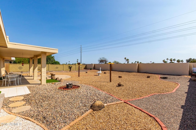 11109 W Granada Dr, Sun City, AZ 85373 - view of yard with a fenced backyard and a patio