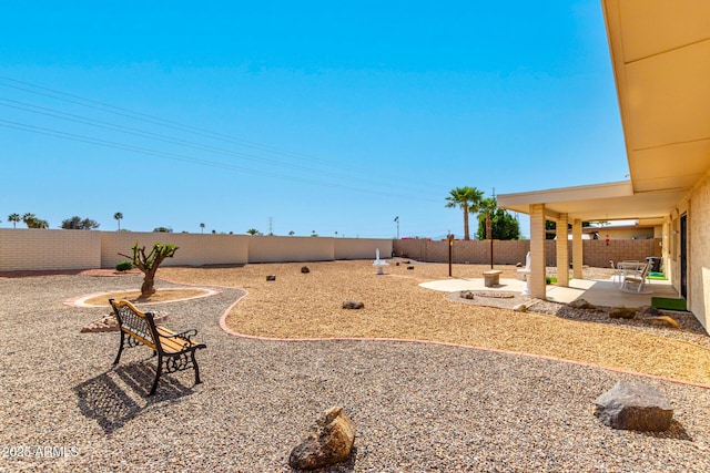 11109 W Granada Dr, Sun City, AZ 85373 - view of yard with a fenced backyard and a patio area