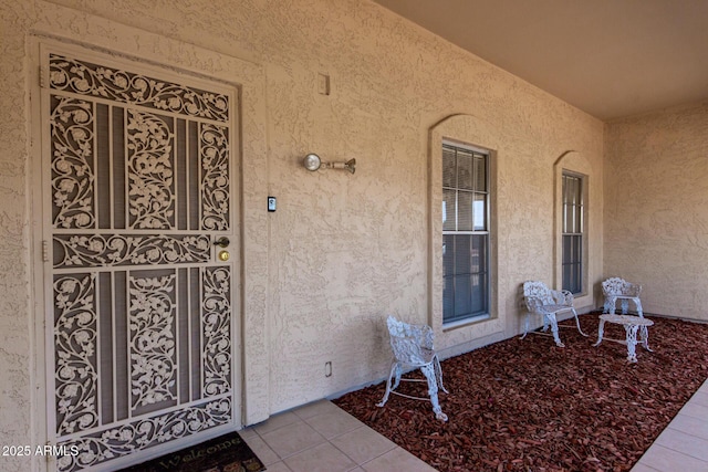 11109 W Granada Dr, Sun City, AZ 85373 - doorway to property featuring stucco siding
