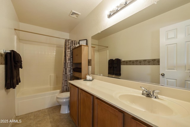 full bathroom with vanity, tile patterned floors, toilet, and shower / bath combo with shower curtain