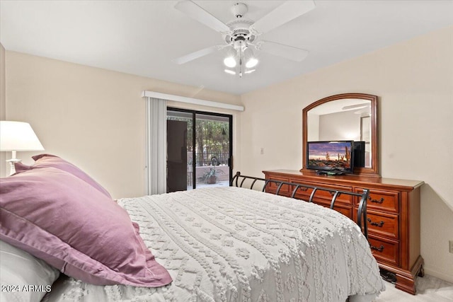 bedroom with access to outside, light colored carpet, and ceiling fan