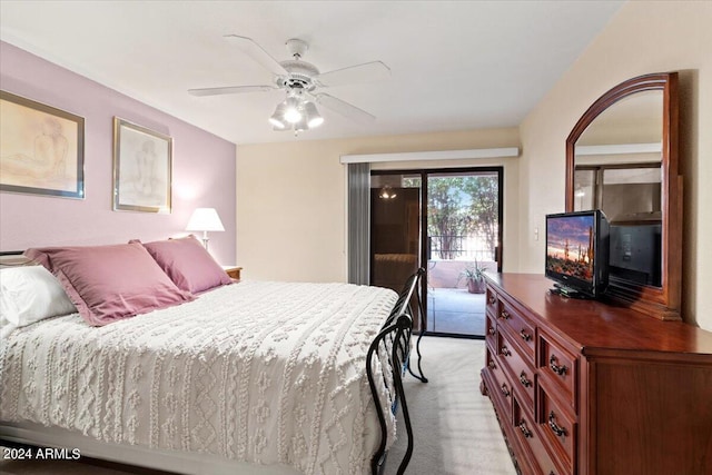 bedroom with light carpet, ceiling fan, and access to outside