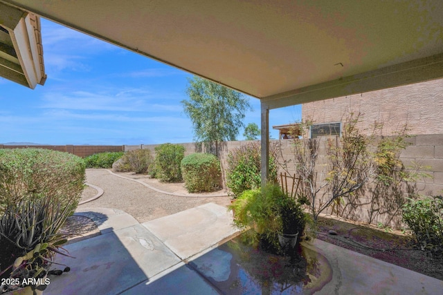 view of patio with a fenced backyard