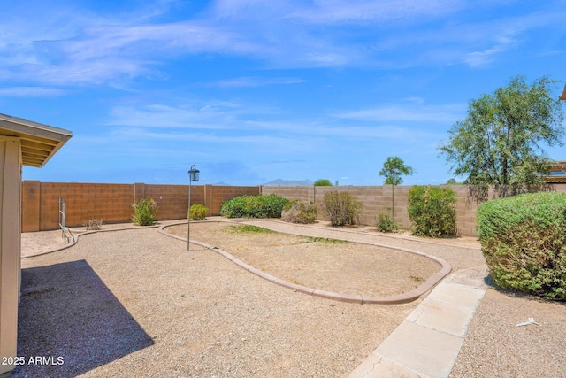 view of yard featuring a fenced backyard