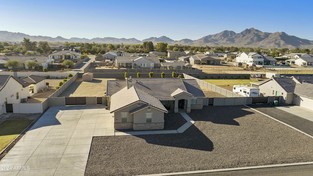 drone / aerial view featuring a mountain view