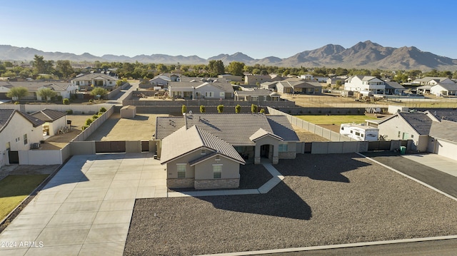 drone / aerial view featuring a mountain view