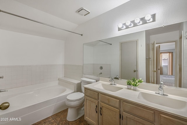 4114 E Muirwood Dr, Phoenix, AZ 85048 - full bath featuring a bath, double vanity, toilet, and tile patterned floors