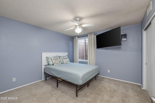 4114 E Muirwood Dr, Phoenix, AZ 85048 - carpeted bedroom with baseboards, a textured ceiling, a ceiling fan, and a closet