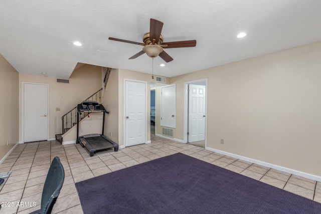 4114 E Muirwood Dr, Phoenix, AZ 85048 - workout room featuring a ceiling fan, light tile patterned flooring, baseboards, and recessed lighting