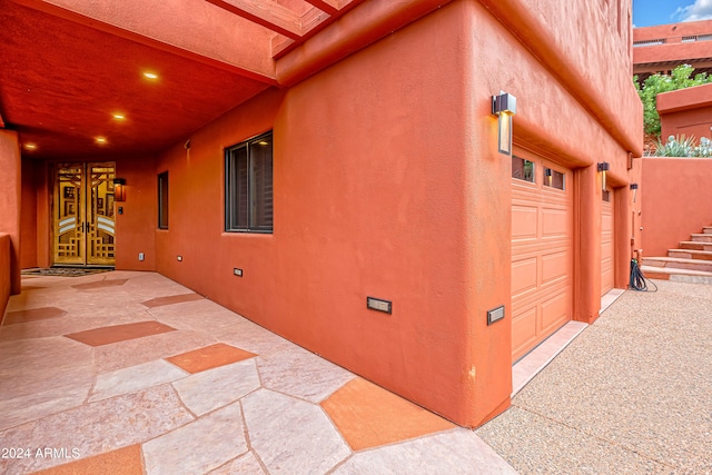 view of property exterior featuring a garage