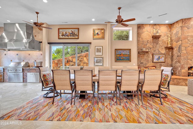 dining room with a healthy amount of sunlight and ceiling fan