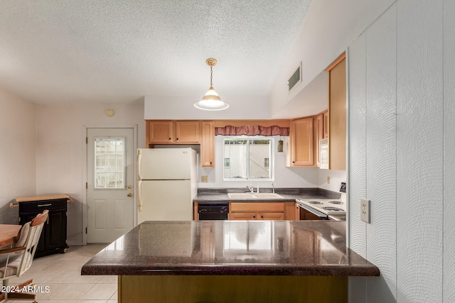 kitchen featuring white appliances, sink, a textured ceiling, kitchen peninsula, and light tile patterned floors