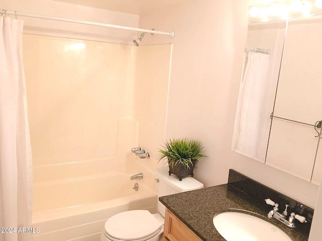 full bathroom featuring vanity, toilet, and shower / bath combo