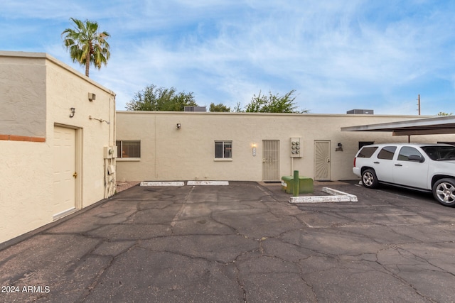 view of building exterior with a carport