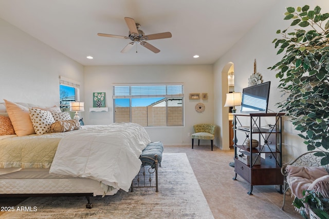 bedroom with ceiling fan and light tile patterned flooring