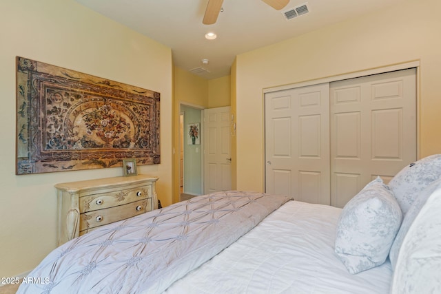 bedroom featuring ceiling fan and a closet