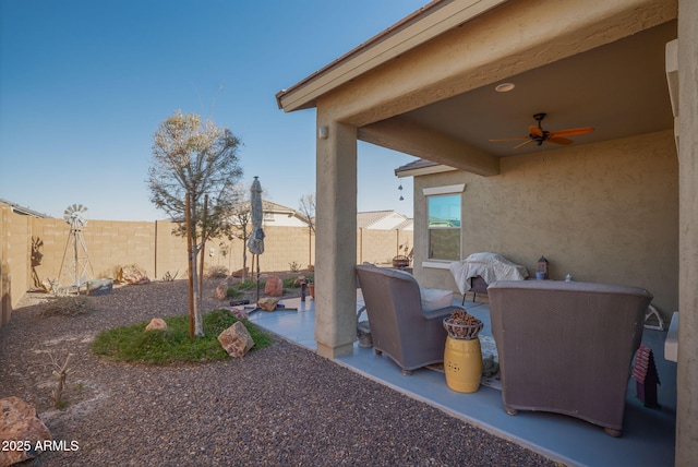 view of patio with ceiling fan