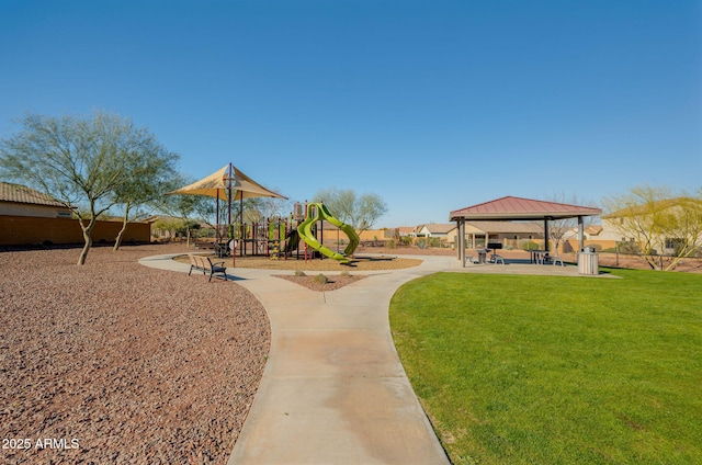 exterior space featuring a gazebo and a lawn