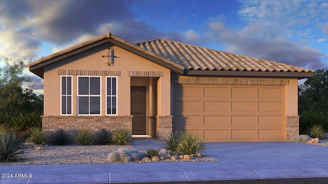 view of front of home with a garage