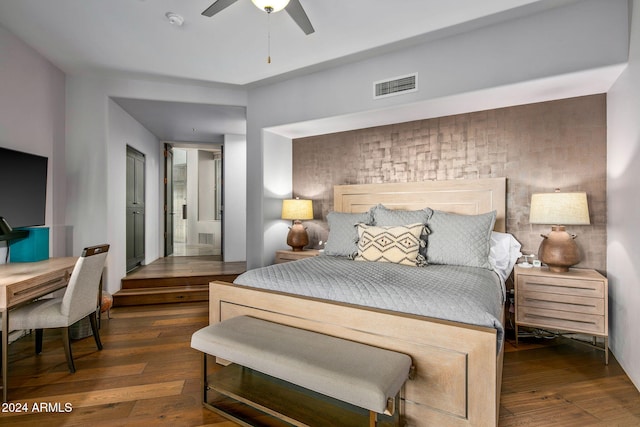 bedroom featuring ceiling fan and dark hardwood / wood-style floors