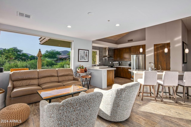 living room with vaulted ceiling