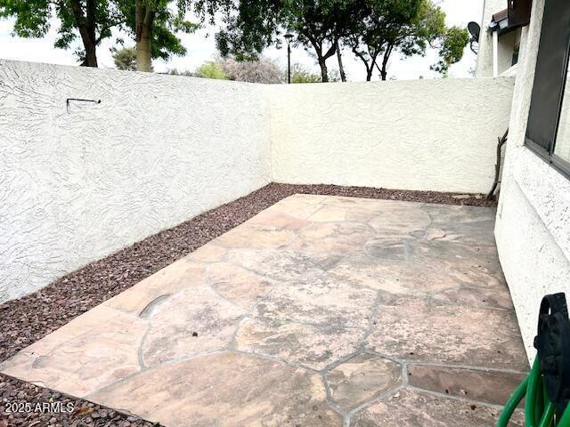 view of patio featuring a fenced backyard