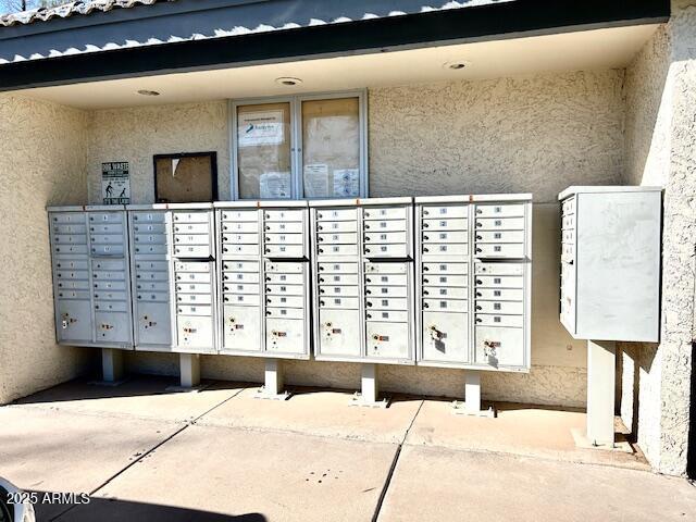 view of community featuring mail area