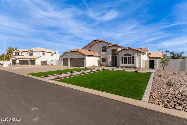 mediterranean / spanish-style house with an attached garage, a tile roof, concrete driveway, stucco siding, and a front lawn