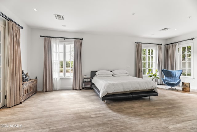 bedroom featuring light hardwood / wood-style floors