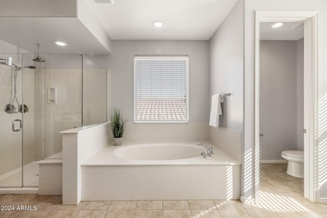 9645 E Theia Dr, Mesa, AZ 85212 - bathroom featuring a stall shower, a bath, toilet, tile patterned floors, and recessed lighting