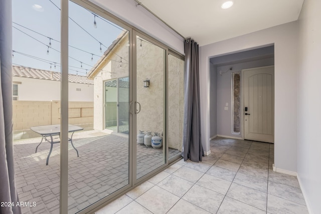 9645 E Theia Dr, Mesa, AZ 85212 - entryway with light tile patterned flooring and baseboards