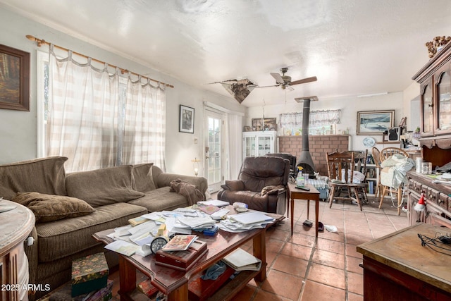 2944 W Northern Ave, Phoenix, AZ 85051 - living room with a wood stove and ceiling fan