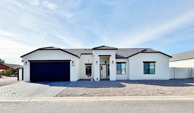 view of front of property with a garage