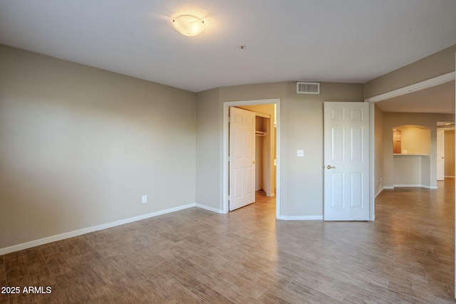 unfurnished bedroom with light hardwood / wood-style flooring