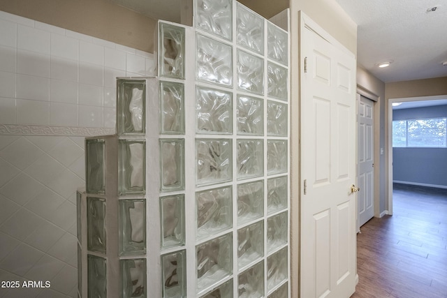 hallway featuring hardwood / wood-style flooring