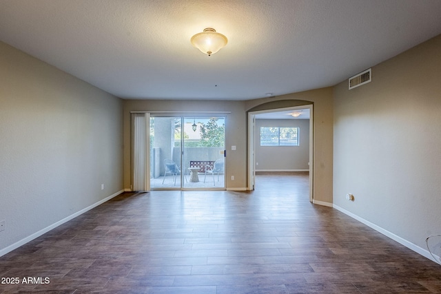 spare room featuring hardwood / wood-style flooring