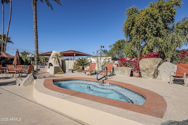 view of pool with a patio area