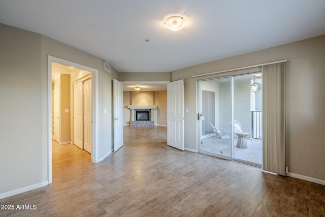 unfurnished room featuring light wood-type flooring